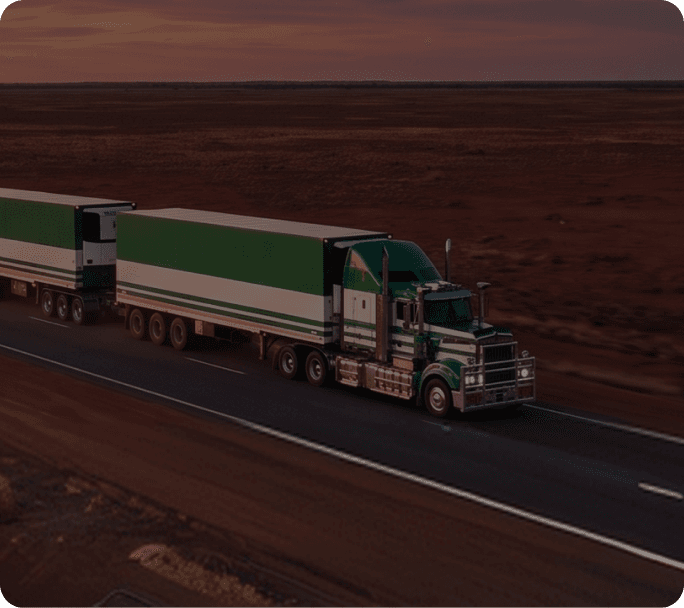 Scarcella road train on the Adelaide to Darwin highway at dusk