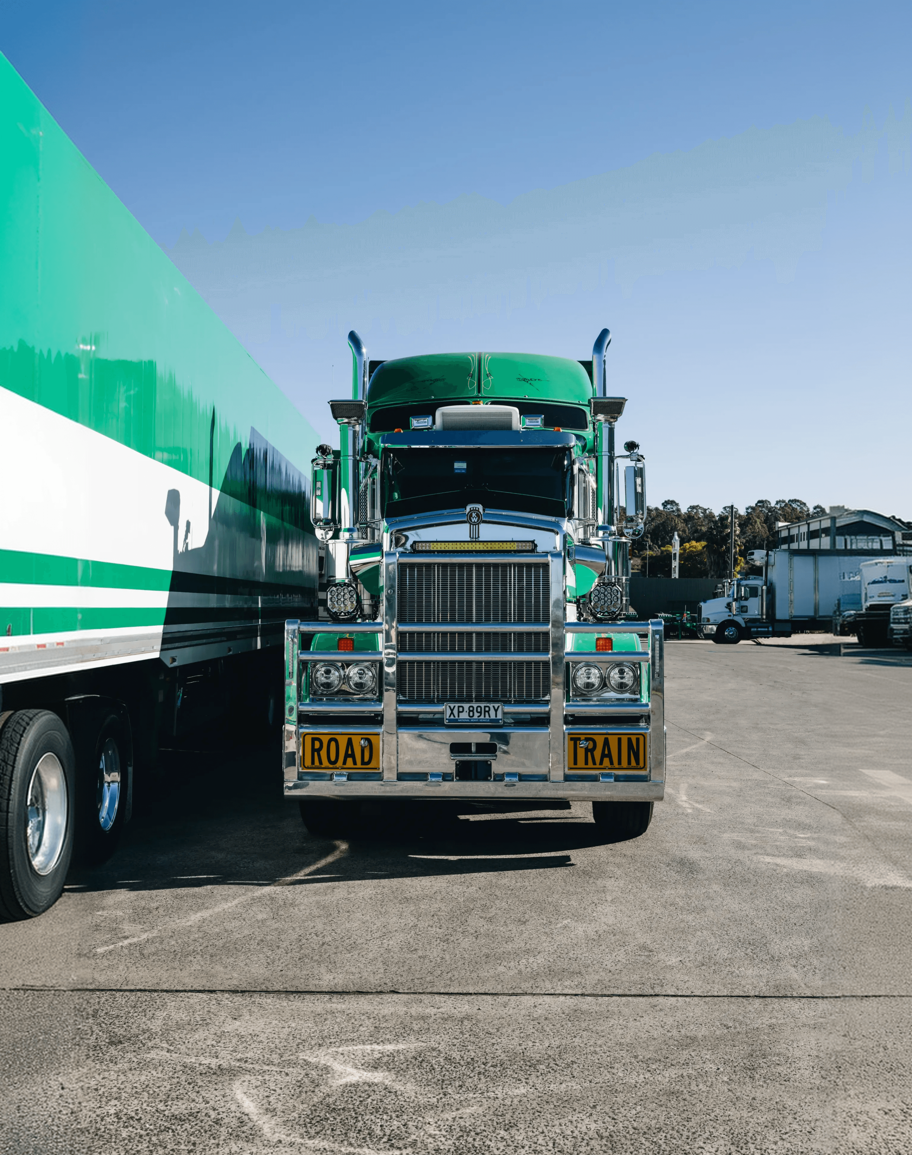 Front-on view of a green Kenworth prime mover with ROAD TRAIN plates